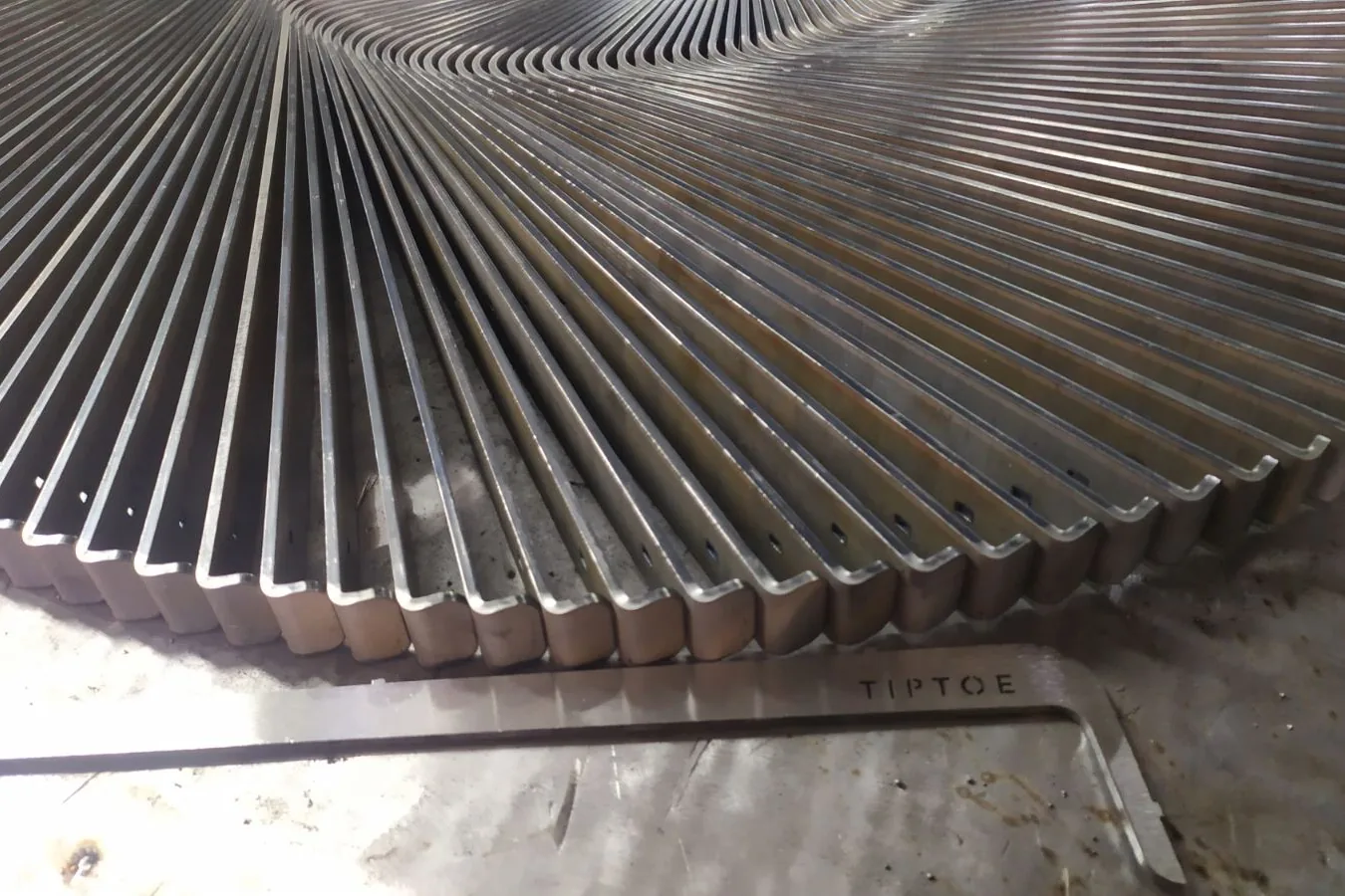 Close view of the radial blades and their uniform spacing on the rotary assembly